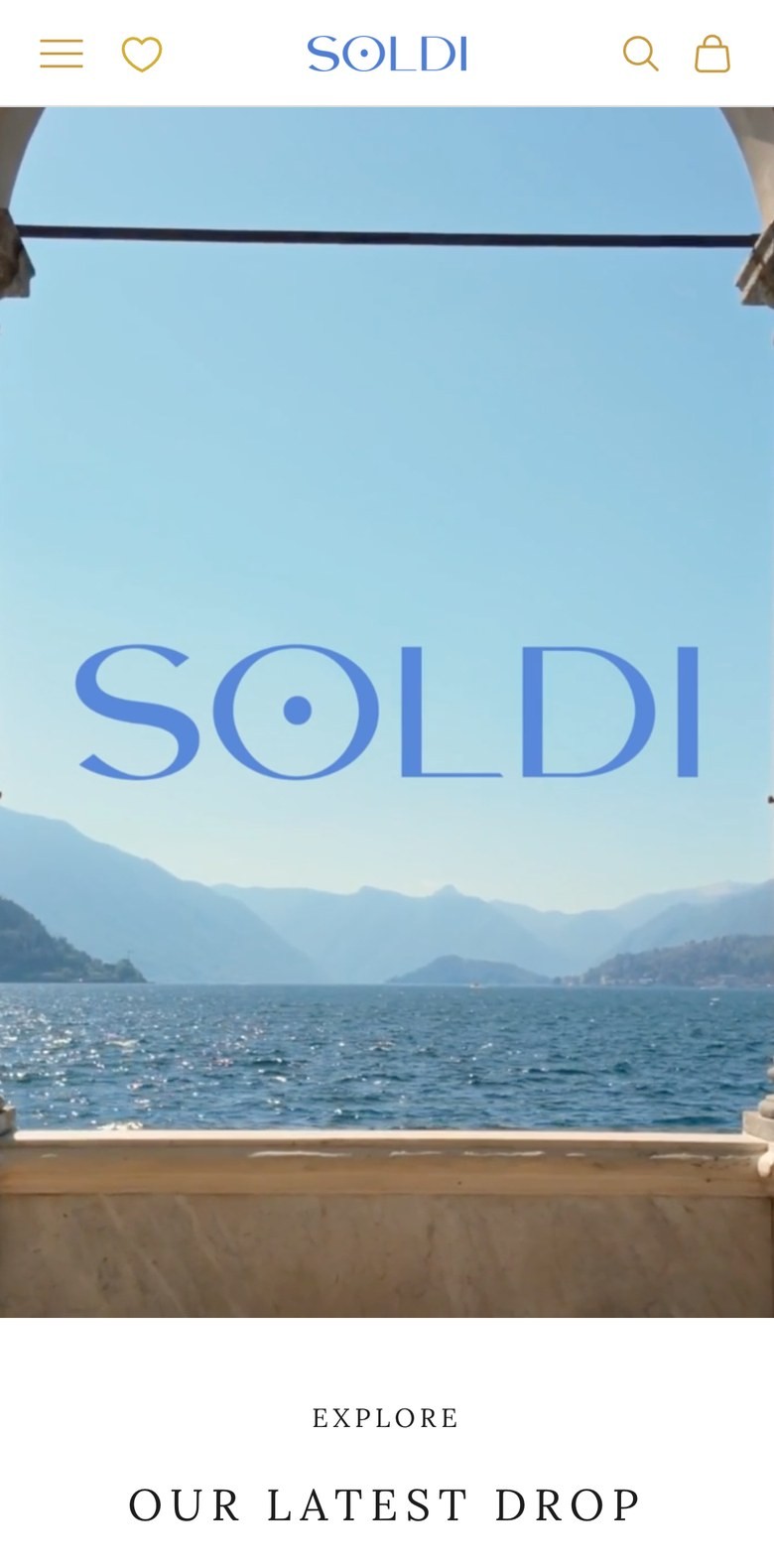 The Soldi mobile homepage: the wordmark over Lake Como