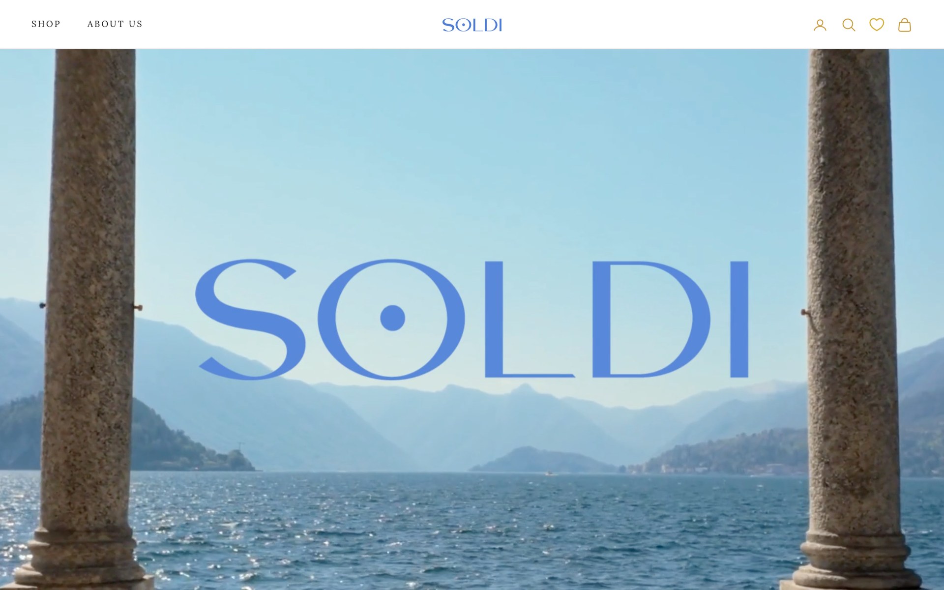 The soldilux.com homepage: the Soldi wordmark over Lake Como